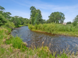 12 Acres with Mountain Views & River Frontage